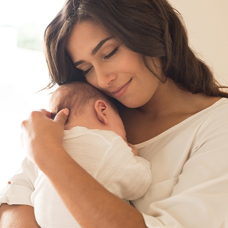 Mother holding infant