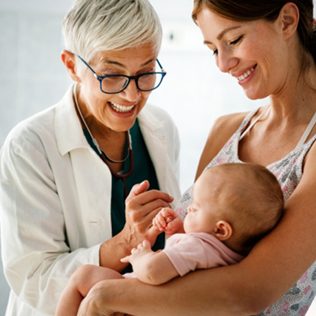 Mother and child interacting with doctor
