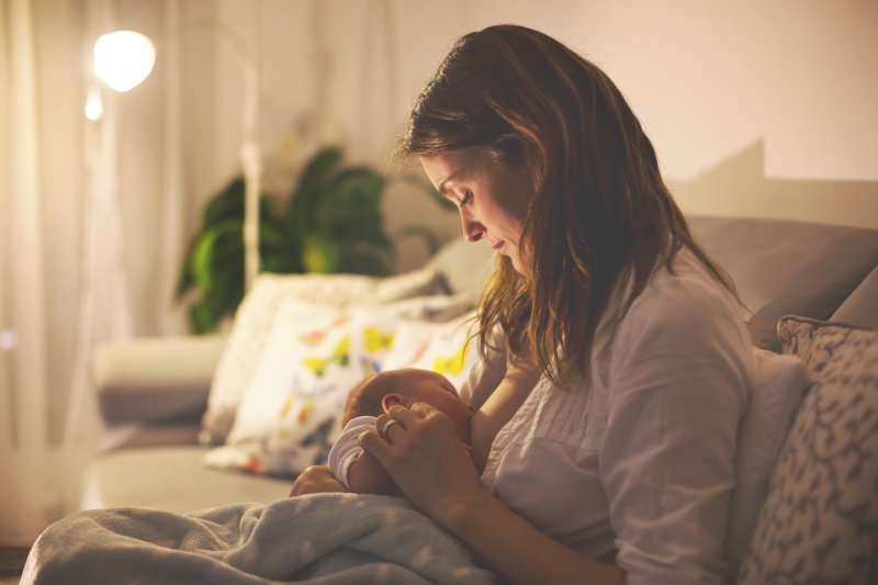 Woman breastfeeding baby