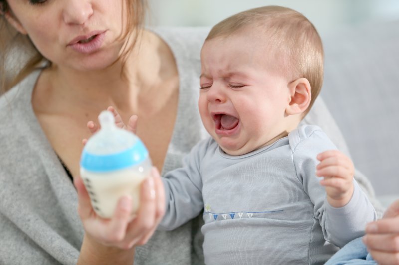 Baby crying due to lip and tongue ties