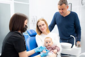Parents asking a specialist about frenectomy recovery